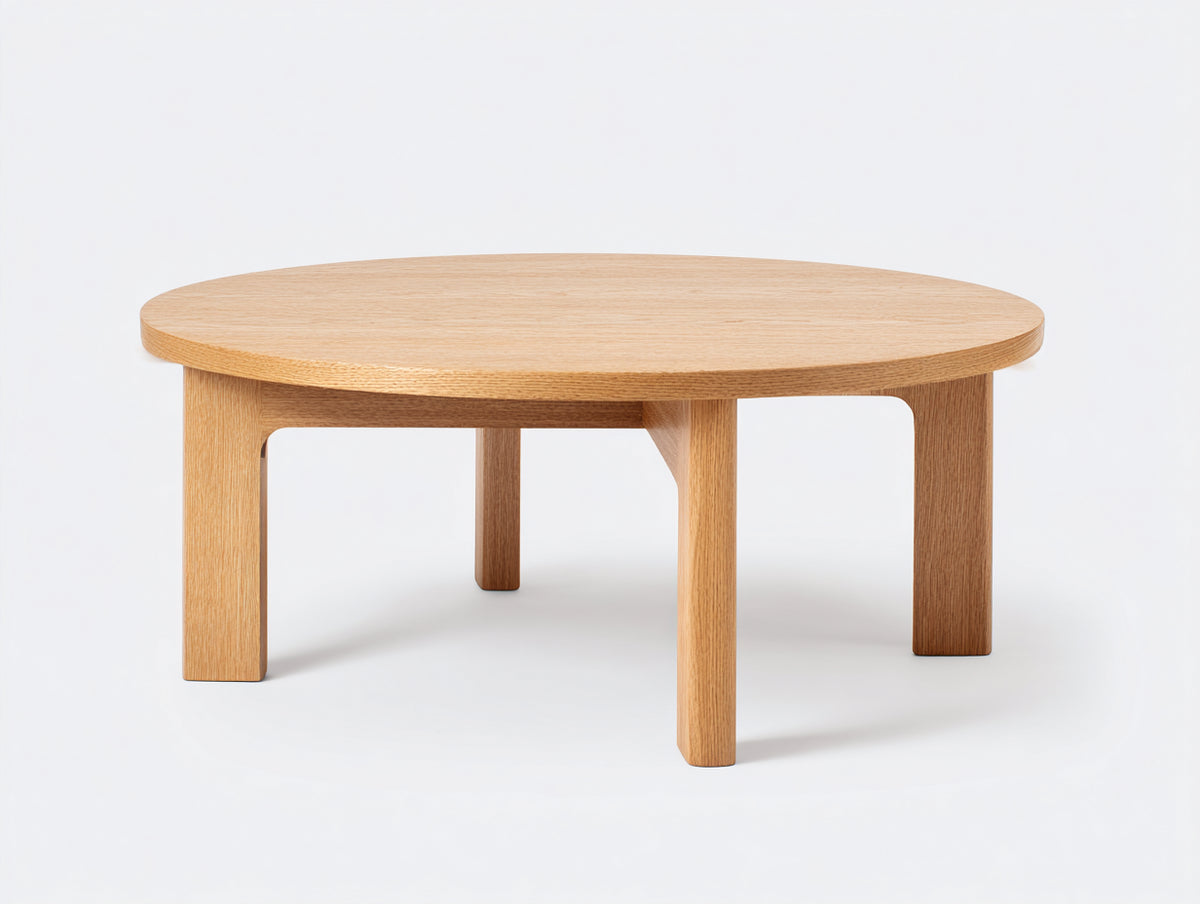 Table à manger ronde 140×140×75 cm - chêne naturel clair - quatre pieds avec renforts courbés pour salle à manger