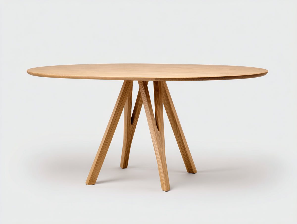 Table à manger 180×90×75 cm - bois chêne clair - plateau ovale et pieds inclinés style naturel pour salle à manger